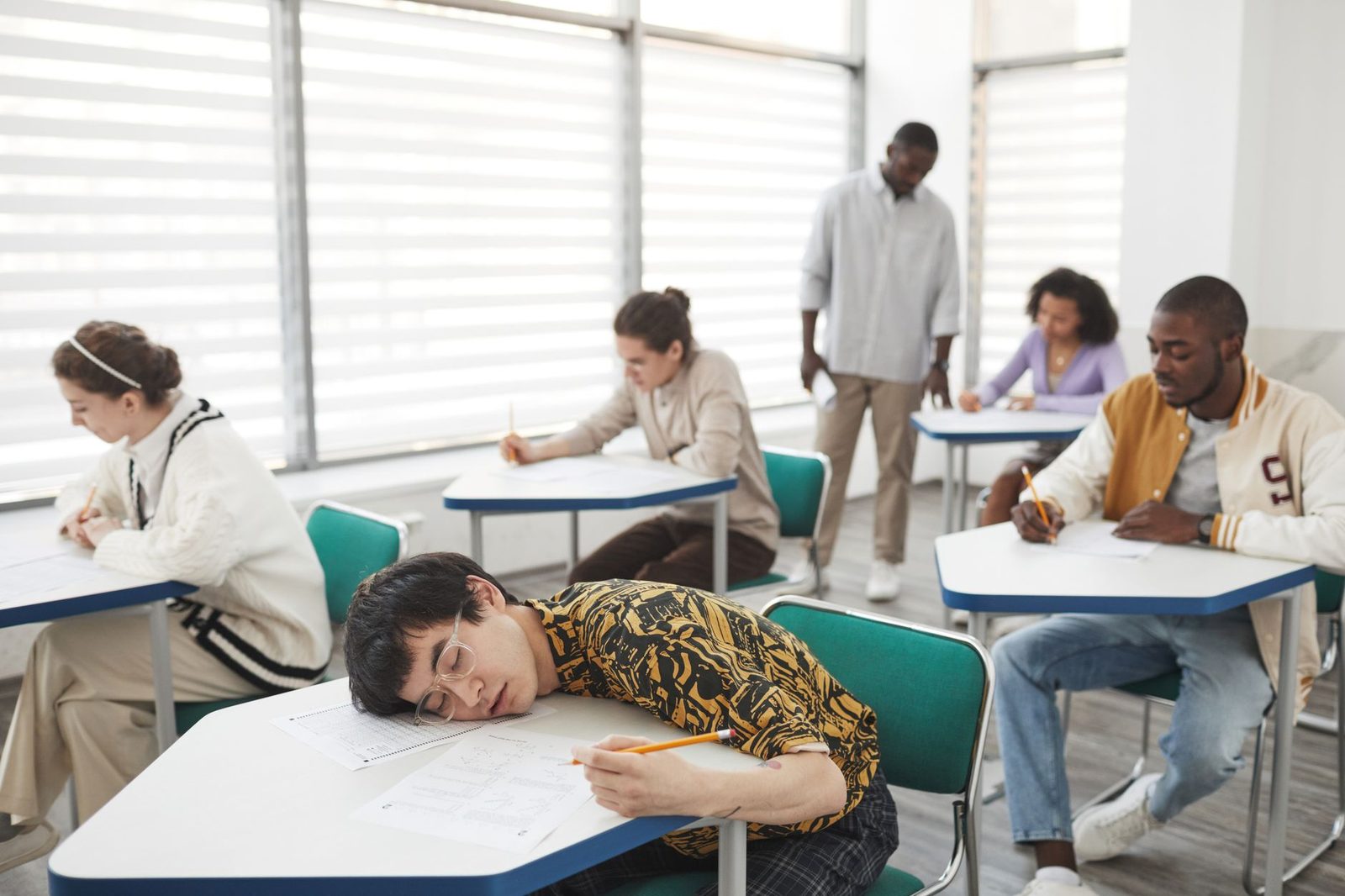 Student reviewing test scores at a desk