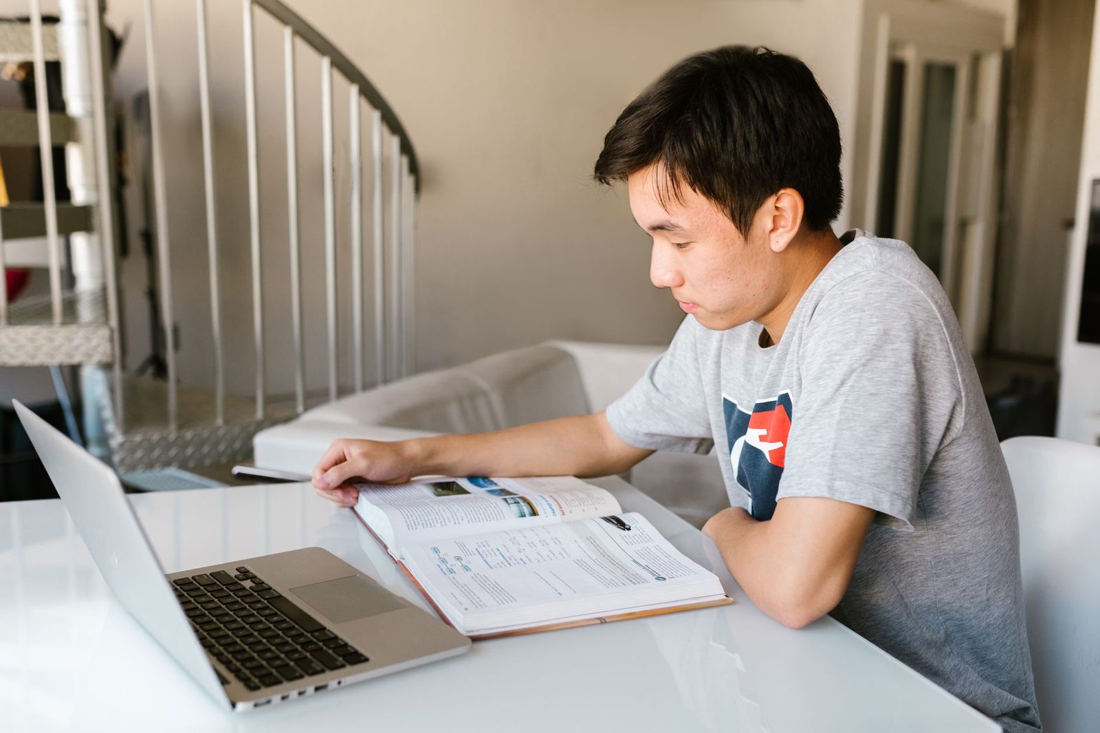 Student studying on laptop for standardized test prep