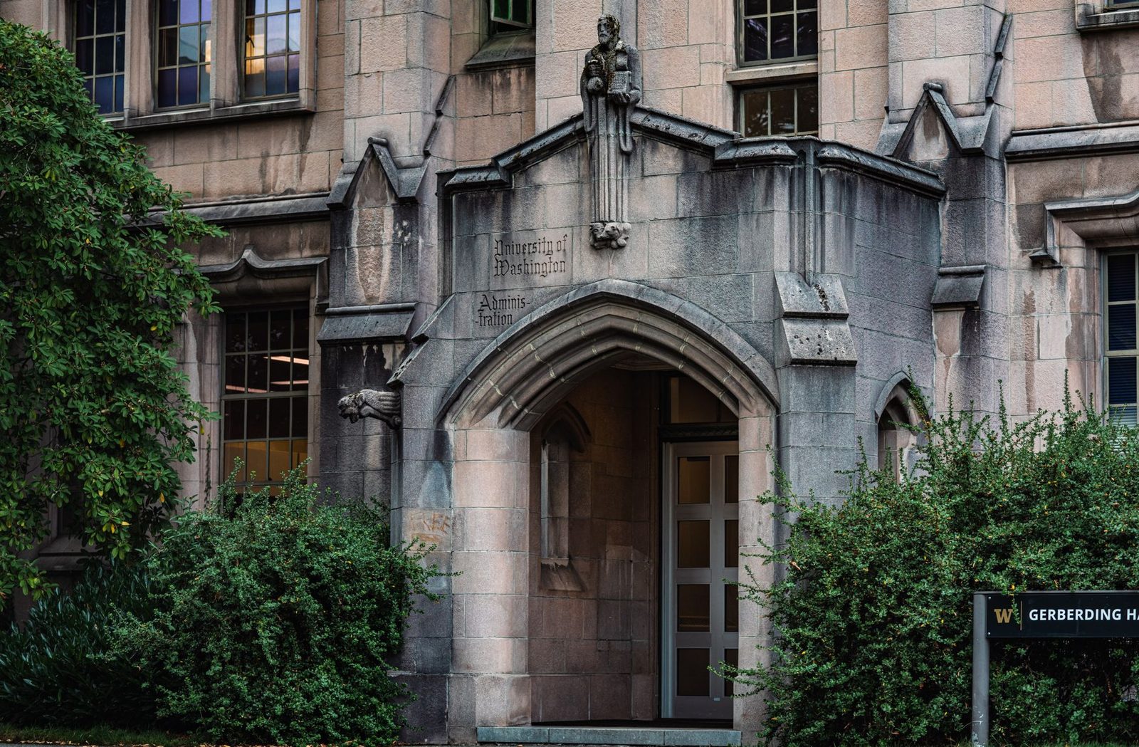 Ivy covered brick building on a university campus
