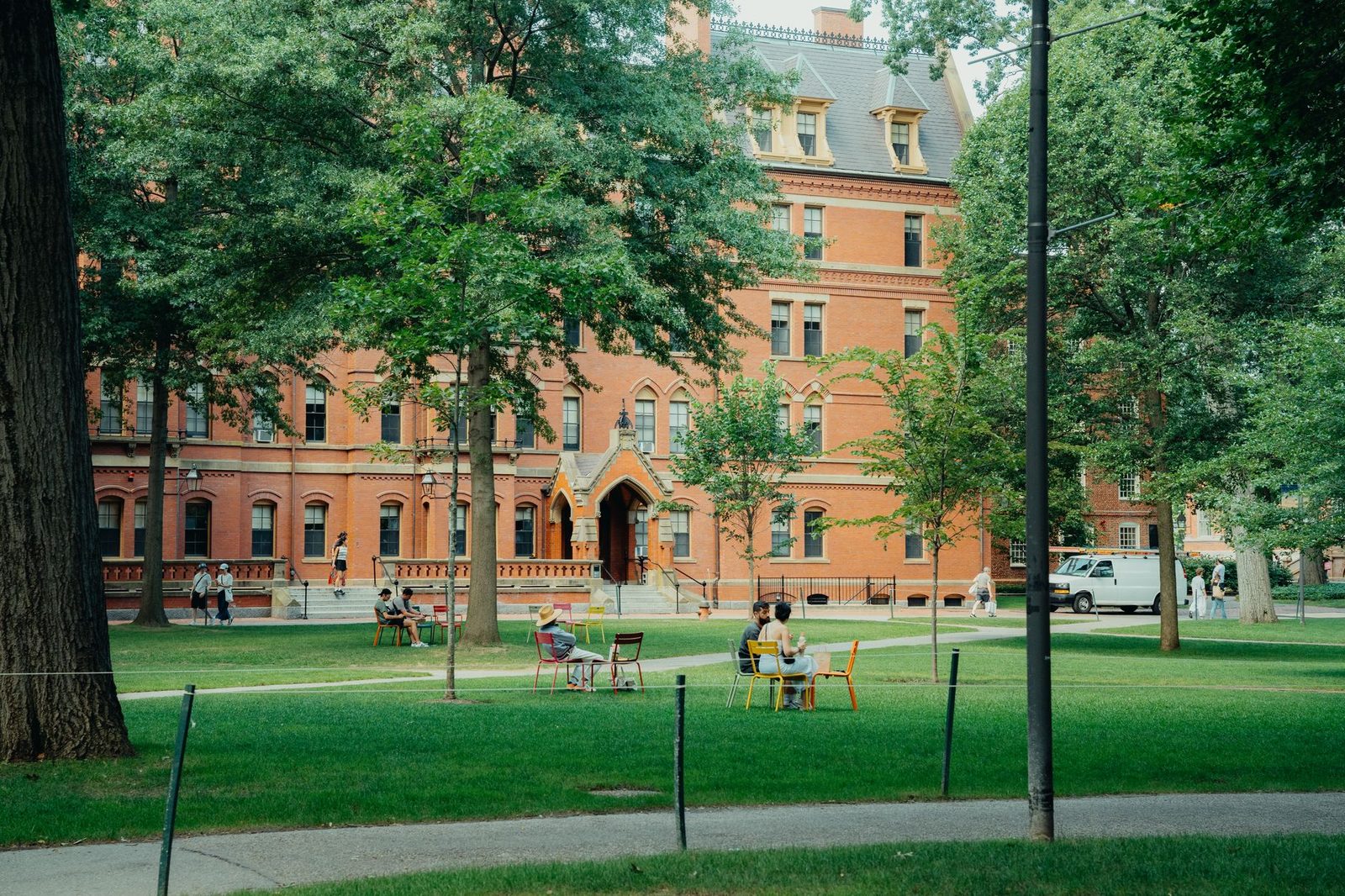 Students walking across a university campus